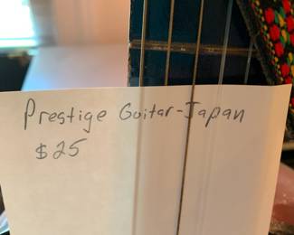 #220 Prestige Guitar - Japan $25.00