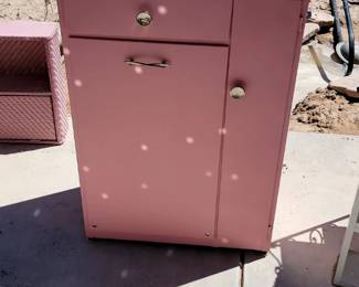 Vintage pink cabinet with hamper