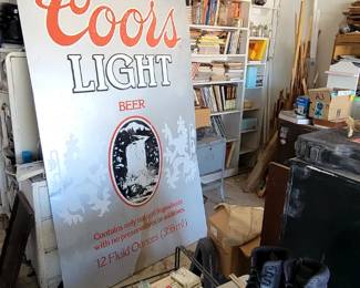 Large Metal Coors light sign from a stadium