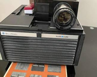 BELL N HOWELL SLIDE CUBE