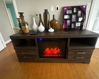 Working electronic fireplace/heater TV console $25