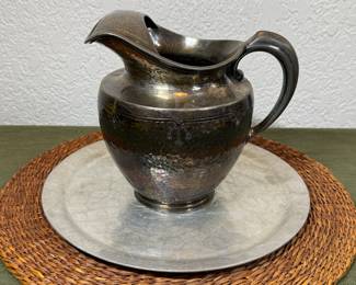 Silver water pitcher