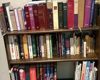 Bibles, books and bookshelf