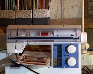 1990’s sewing machine with manuals.