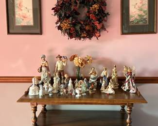 Dining room side table with ceramic Amish-themed/farm themed figurines.
