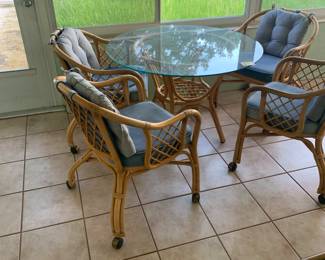 Rattan and glass table and chairs