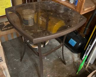 glass-topped outdoor table