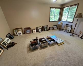 paintings, framed posters, empty picture frames