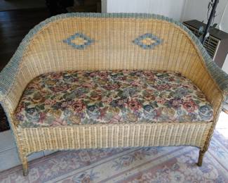Large comfy wicker couch, complete with cushion
