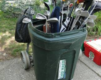 FORE!! Clubs in a garbage can!