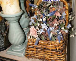 Floral in wicker basket with white and blue handle
