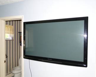 Flat screen wall mounted TV.