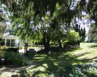 Large yard, filled with art and treasure