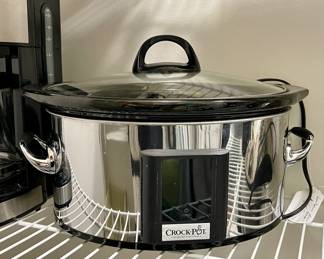 Kitchen Appliance & Storage Closet
Small appliances, kitchen wares, Tupperware.
Crock pot