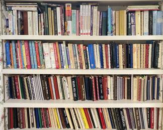 In the Kitchen-
Extensive Cookbook Library... there are more than in this photo.