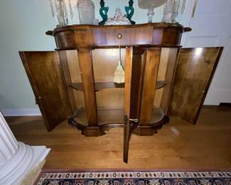 Serpentine Front Console cabinet.
3 drawers and open cabinet shelves