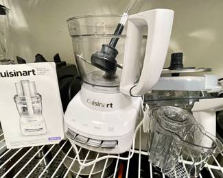 Kitchen Appliance & Storage Closet
Small appliances, kitchen wares, Tupperware.
Cuisinart