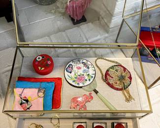 Asian Treasures
Jade & Enamel hand mirror, Small beaded coin purse, Lovely enamel charm bead necklace, 3 vintage Cinnabar Lamp finials in their original boxes