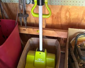 Snow Joe electric snow blower. Also Sun Joe small tiller