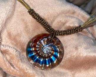 Multi-Colored Glass Blown Flower Vortex Pendant Necklace  $38