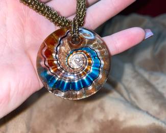 Multi-Colored Glass Blown Flower Vortex Pendant Necklace  $38