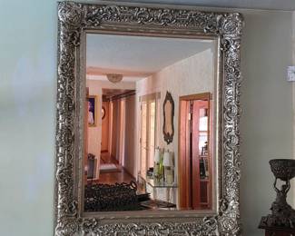 Ornate silver wall mirror