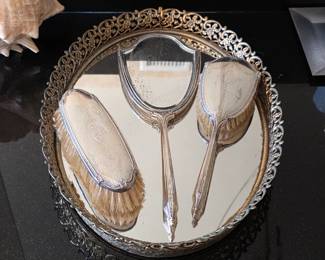 Vintage ornate vanity mirror and brush set