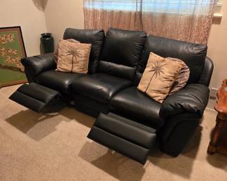 Black leather recliner sofa