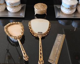 Vintage ornate vanity mirror and brush set