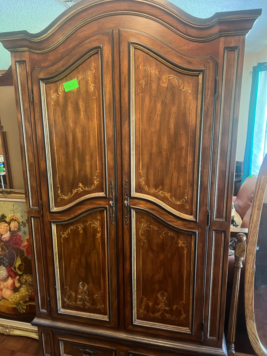 Armoire with lots of interior shelving