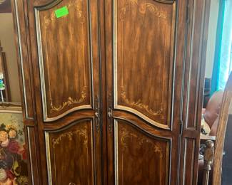Armoire with lots of interior shelving