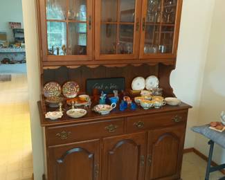 Classic china hutch, teacups and glass shoes