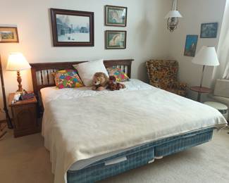King size bed.  Art, floral granny chair and lamps