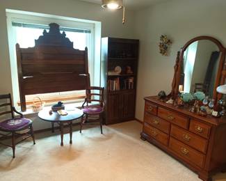 Eastlake bed, another dresser with mirror, old chairs with embroidered seats and small dropleaf end table