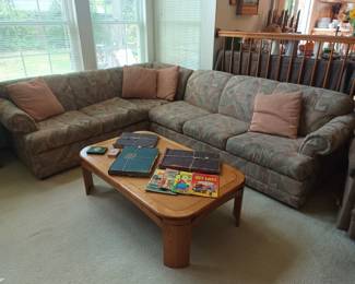 Sectional sofa, vintage portfolios and comics