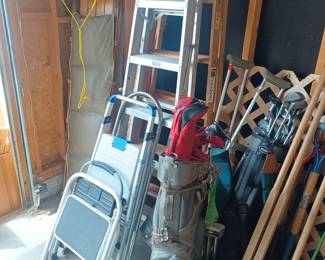 Golf clubs, ladders, stepstools and tobaggan