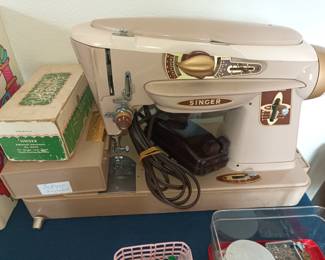 One more vintage Singer sewing machine.   Almost Art Deco style!