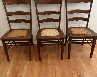 C148 - $125. Set of 3 Antique Caned Chairs.
