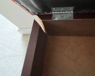 C108 - $20. Upholstered Storage Bench. One corner needs repair. Measures 37" wide x 14.5" deep x 17" tall.