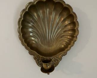 C111 - $15. Brass Candle Sconce. Measures 11.5" wide x 14" tall.