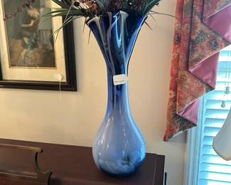 C83 - $35. Tall Glass Vase measures 20.5" tall.