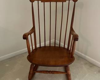 C107 - $60. Vintage Nichols & Stone Wooden Rocker. Measures 22.5" wide x 13" floor to seat x 39.5 Floor to top of back.