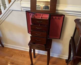 C42 - $35. Small Jewelry Box. Measures 12.25" wide x 8.5" deep x 33.5" tall. Very petite size - pressed wood.