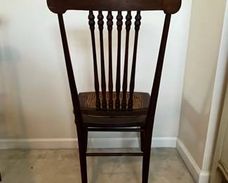 C102 - $50 PAIR of Antique Spindle Chairs. Single Caned - no holes but aged caning. Measures 16.5" wide x 17" floor to seat x 35.5" tall.