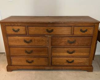 C99 - $60. Harvest Oak Dresser. Measure 56" wide x 19.5" deep x 33.5" tall. Good condition.