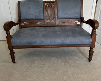 C31 - $150. Antique Upholstered Bench / Couch. Measures 47.5" wide x 16.5" deep x 33" tall. Sturdy and in very good condition! Ceramic Caster Feet.