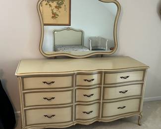 C9 - $150. Drexel Dresser with Mirror. Measures 63.5" x 22.5" deep x 34.5" tall. Mirror is 44.5" x 37". Minor crazing on the paint on the top.