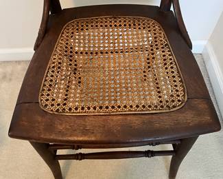 C102 - $50 PAIR of Antique Spindle Chairs. Single Caned - no holes but aged caning. Measures 16.5" wide x 17" floor to seat x 35.5" tall.