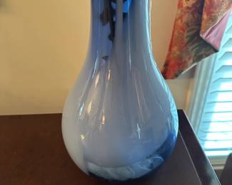 C83 - $35. Tall Glass Vase measures 20.5" tall.