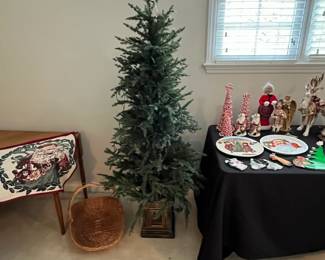 C103 - $30. Faux Christmas Tree measures 63" tall.